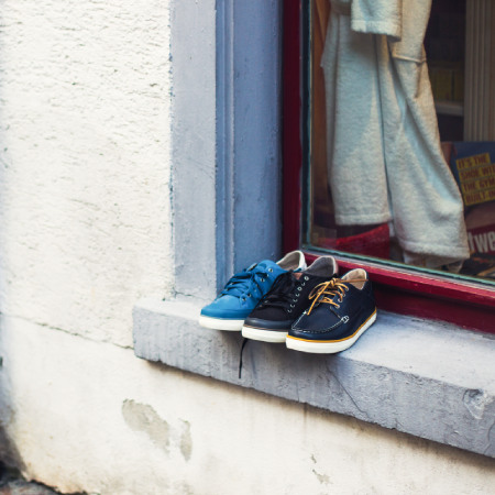 Shoes stored on the window outside