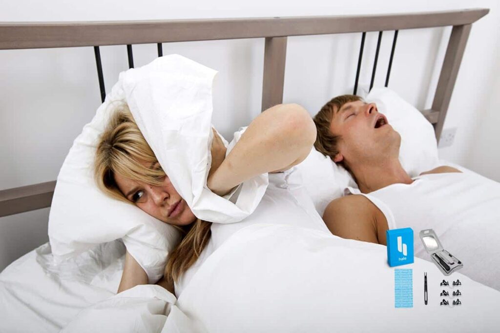 wife annoyed because husband is snoring