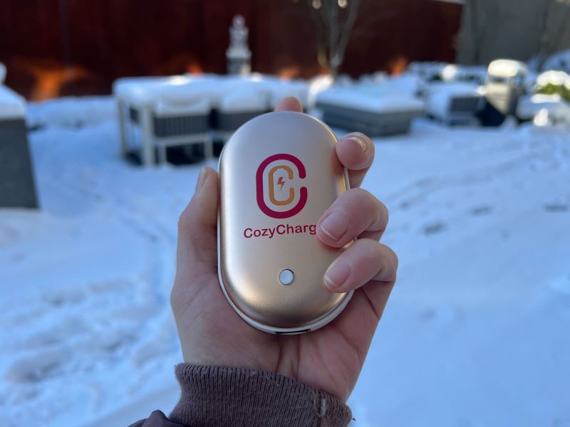 girl holding cozycharge