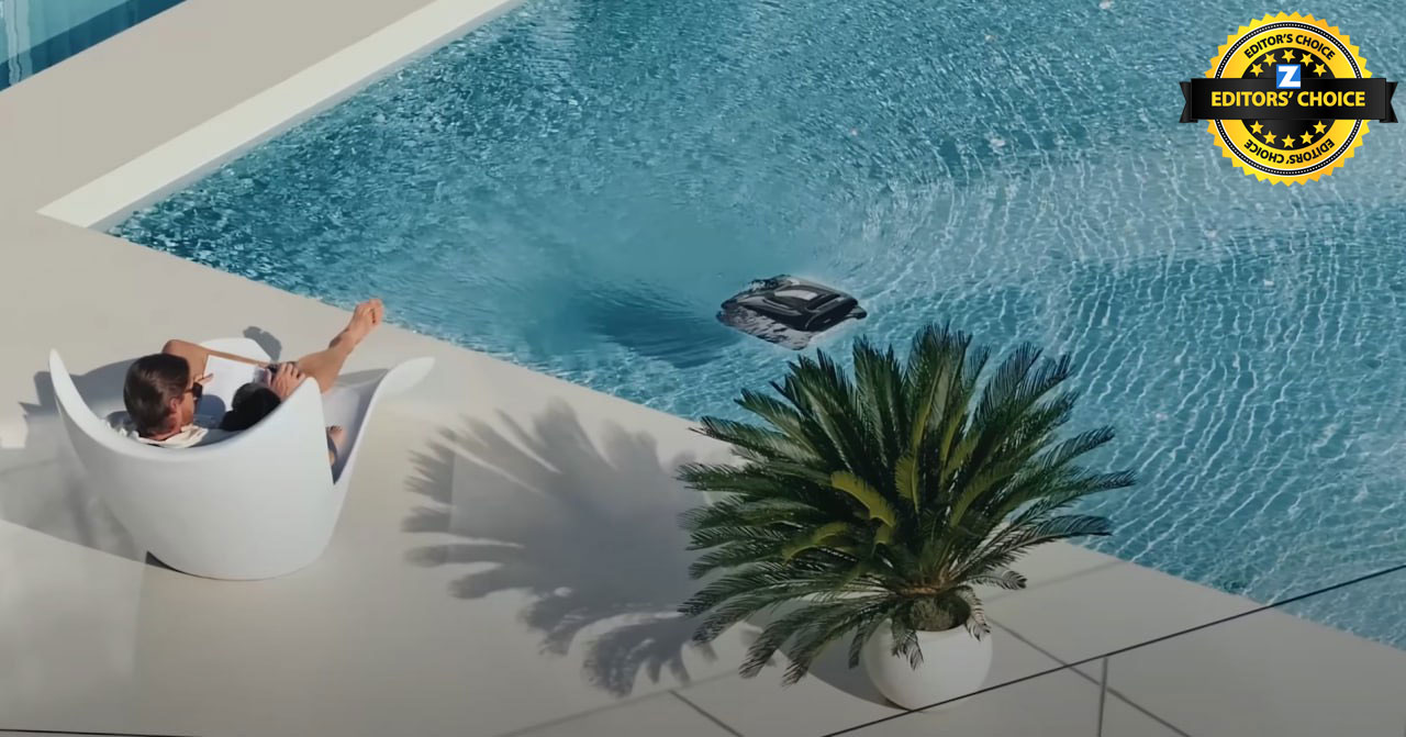 Enjoying effortless pool maintenance: Person relaxes as a robotic pool cleaner keeps the crystal-clear water sparkling.